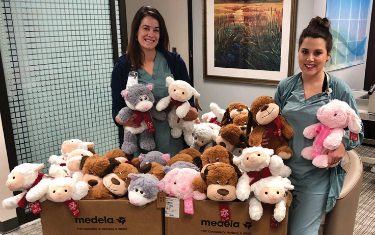 Smiling nurses with stuffed animals at CCMH
