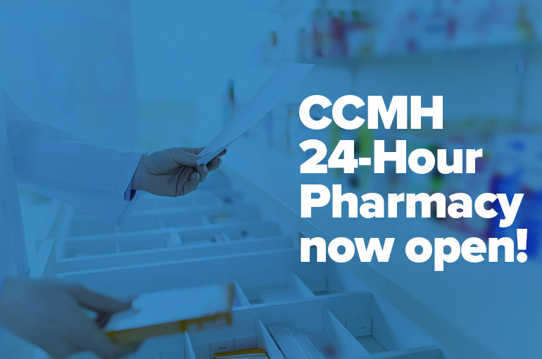 pharmacy and pharmacist holding medication and a paper with text "CCMH 24-hour pharmacy now open!"