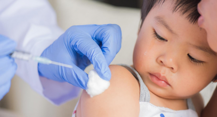 Small child getting vaccinated