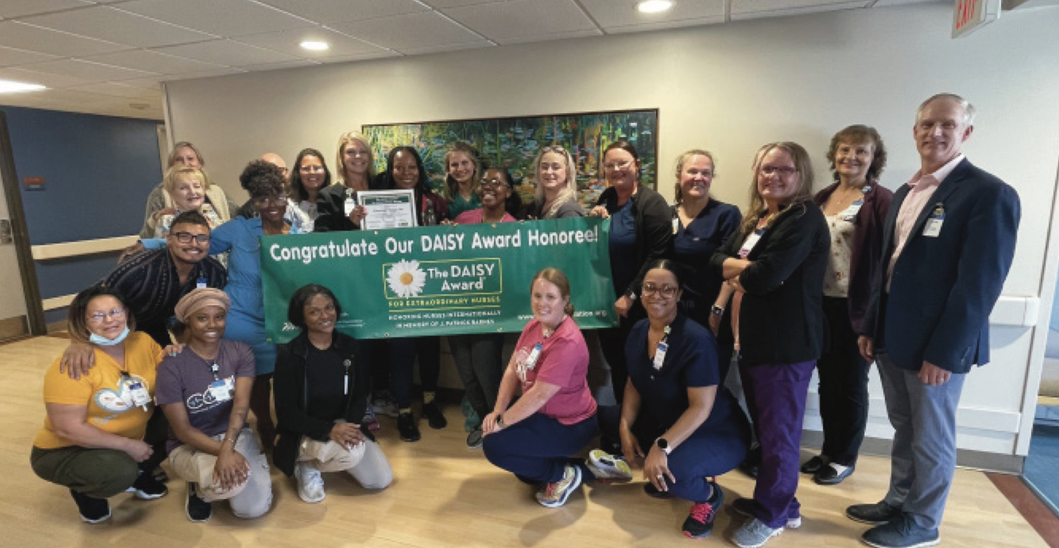 Nursing Team with Daisy Award Banner