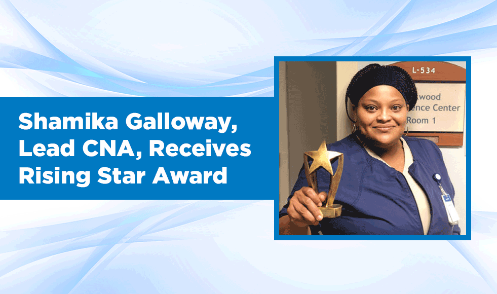 Shamika Galloway holding Rising Star Award